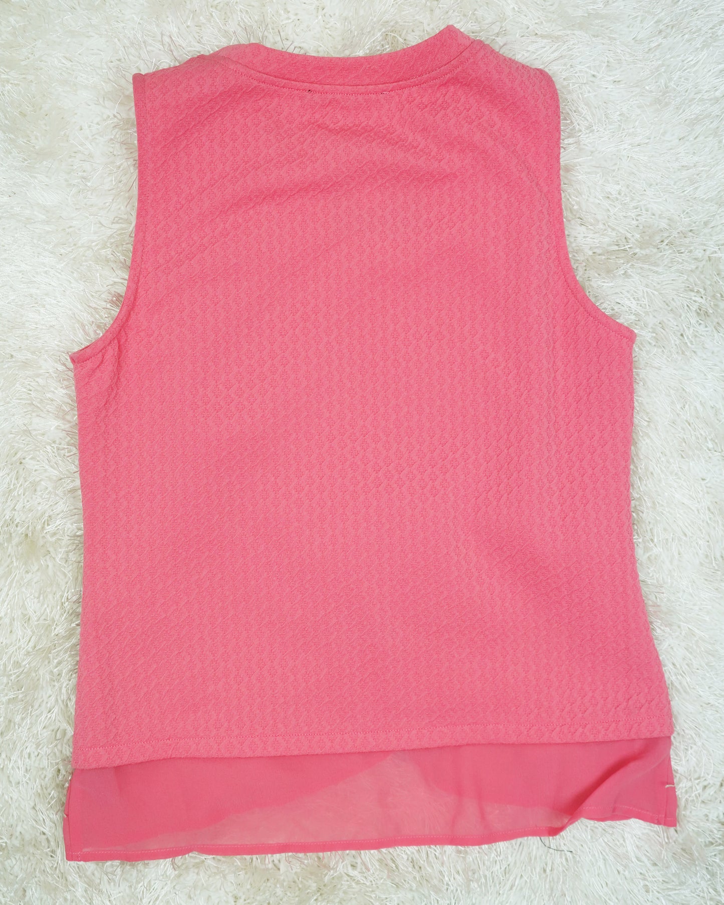 Pink Sleeveless Blouse with Layered Hem & Diamond Pattern Texture